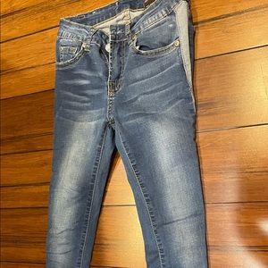 Blue jeans with light blue stripe on the side